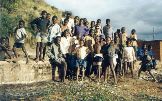 In the bad lands with the village kids, I'm the white guy!
